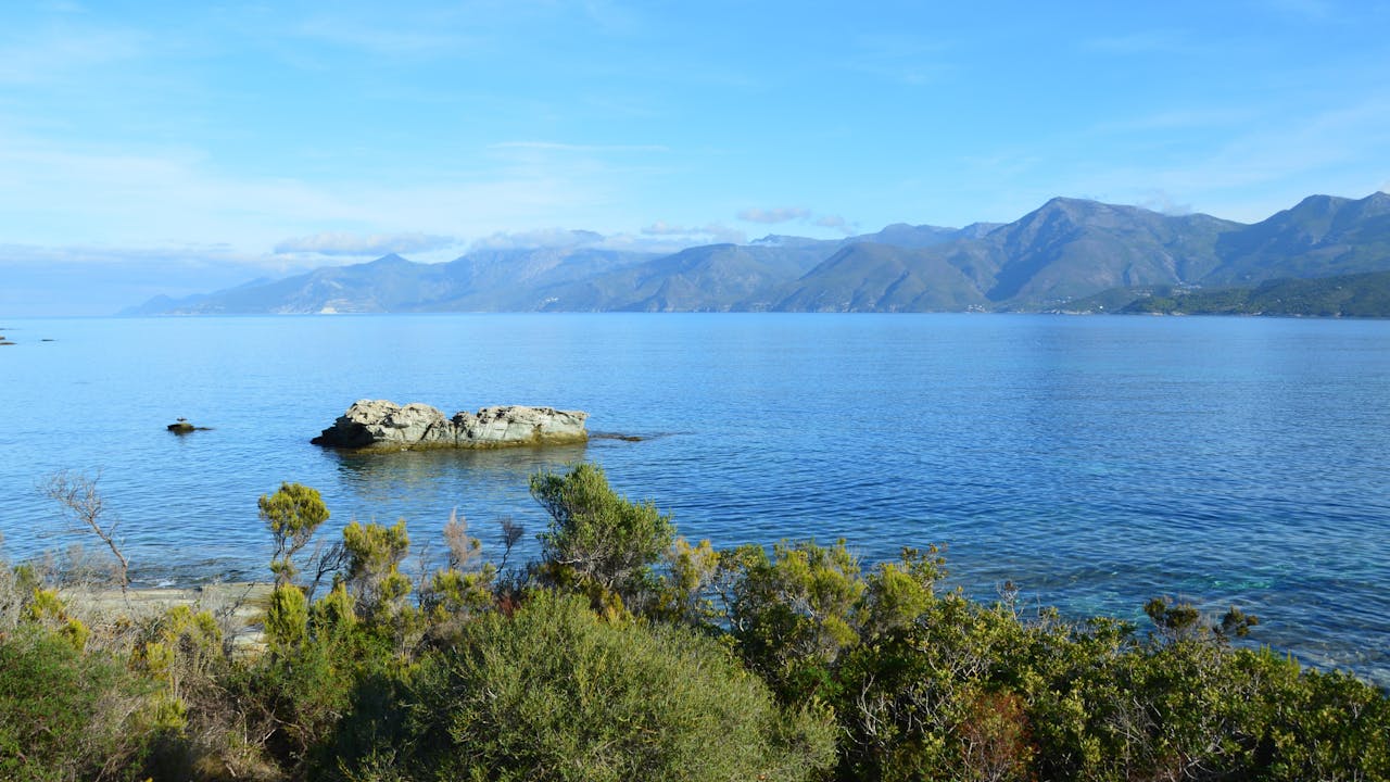 Stunning view of the coastline and mountains in Patrimonio, Corsica, France.